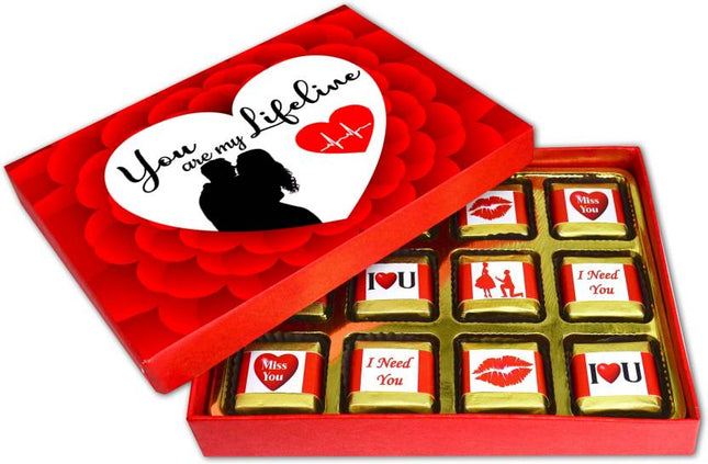 Valentine gift set featuring premium chocolates, a romantic printed mug, and a soft cushion – perfect for expressing love to your partner