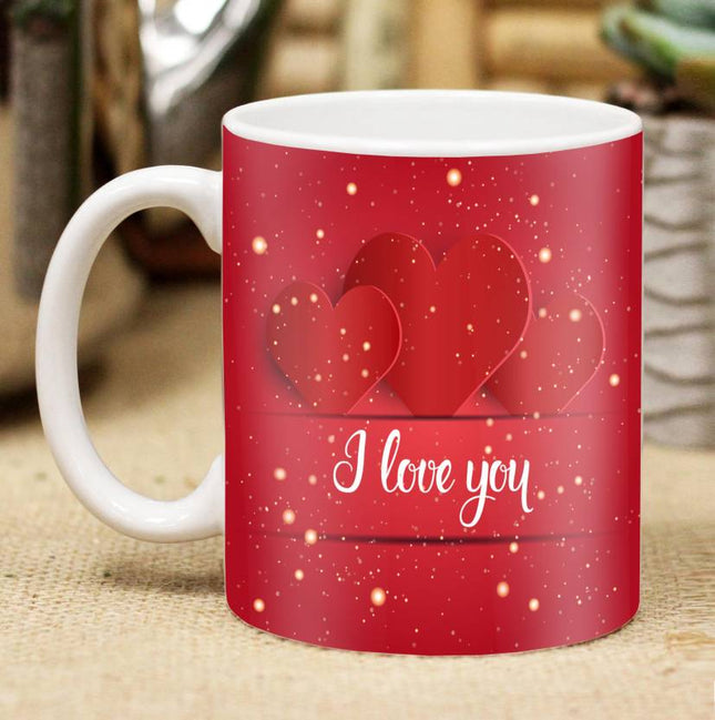 Valentine gift set featuring premium chocolates, a romantic printed mug, and a soft cushion – perfect for expressing love to your partner.