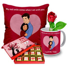 Valentine gift set featuring premium chocolates, a romantic printed mug, rose and a soft heart cushion – perfect for expressing love to your partner.