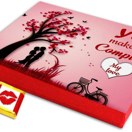 Valentine gift set featuring premium chocolates, a romantic printed mug, rose and a soft cushion – perfect for expressing love to your partner.