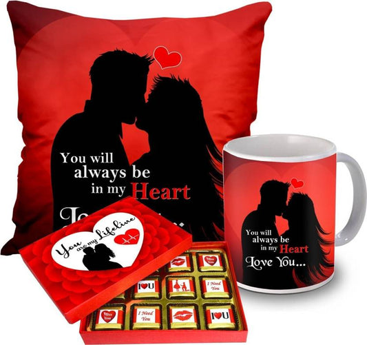 Valentine gift set featuring premium chocolates, a romantic printed mug, and a soft cushion – perfect for expressing love to your partner