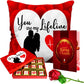 Valentine gift set featuring premium chocolates, a romantic printed mug, and a soft cushion – perfect for expressing love to your partner.