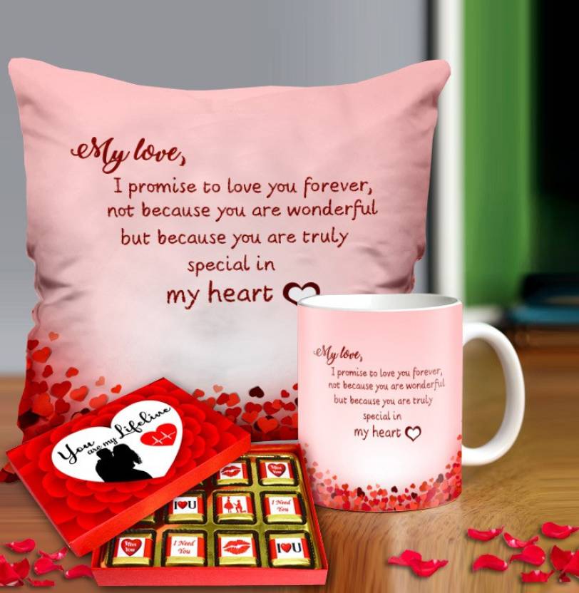 Valentine gift set featuring premium chocolates, a romantic printed mug, and a soft cushion – perfect for expressing love to your partner.