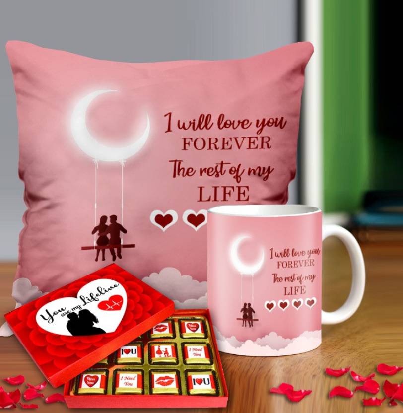 Valentine gift set featuring premium chocolates, a romantic printed mug, and a soft cushion – perfect for expressing love to your partner.