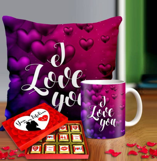 Valentine gift set featuring premium chocolates, a romantic printed mug, and a soft cushion – perfect for expressing love to your partner.