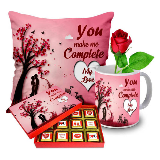 Valentine gift set featuring premium chocolates, a romantic printed mug, rose and a soft cushion – perfect for expressing love to your partner.