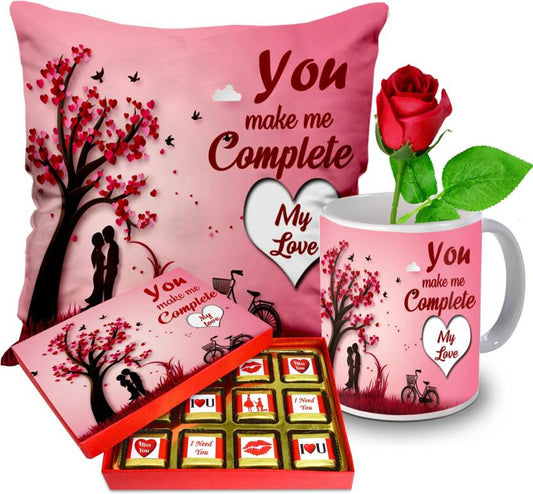 Valentine gift set featuring premium chocolates, a romantic printed mug, rose and a soft cushion – perfect for expressing love to your partner.