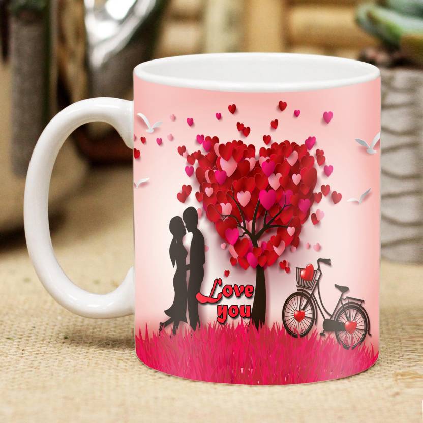 Valentine gift set featuring premium chocolates, a romantic printed mug, and a soft cushion – perfect for expressing love to your partner.