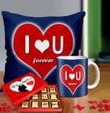 Valentine gift set featuring premium chocolates, a romantic printed mug, and a soft cushion – perfect for expressing love to your partner.