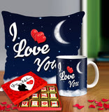 Valentine gift set featuring premium chocolates, a romantic printed mug, and a soft cushion – perfect for expressing love to your partner.