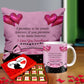 Valentine gift set featuring premium chocolates, a romantic printed mug, and a soft cushion – perfect for expressing love to your partner.