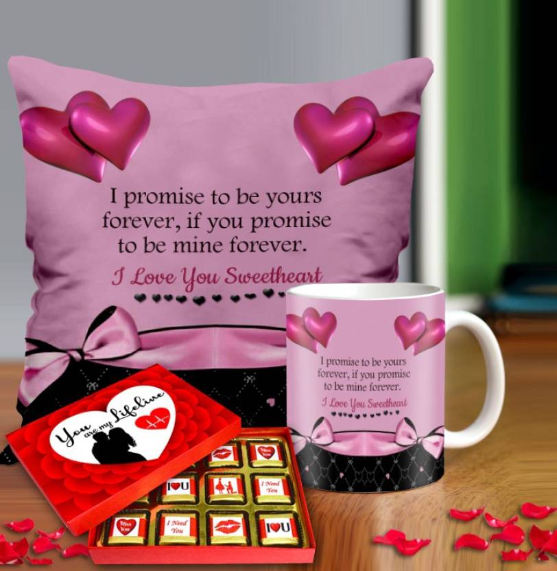 Valentine gift set featuring premium chocolates, a romantic printed mug, and a soft cushion – perfect for expressing love to your partner.