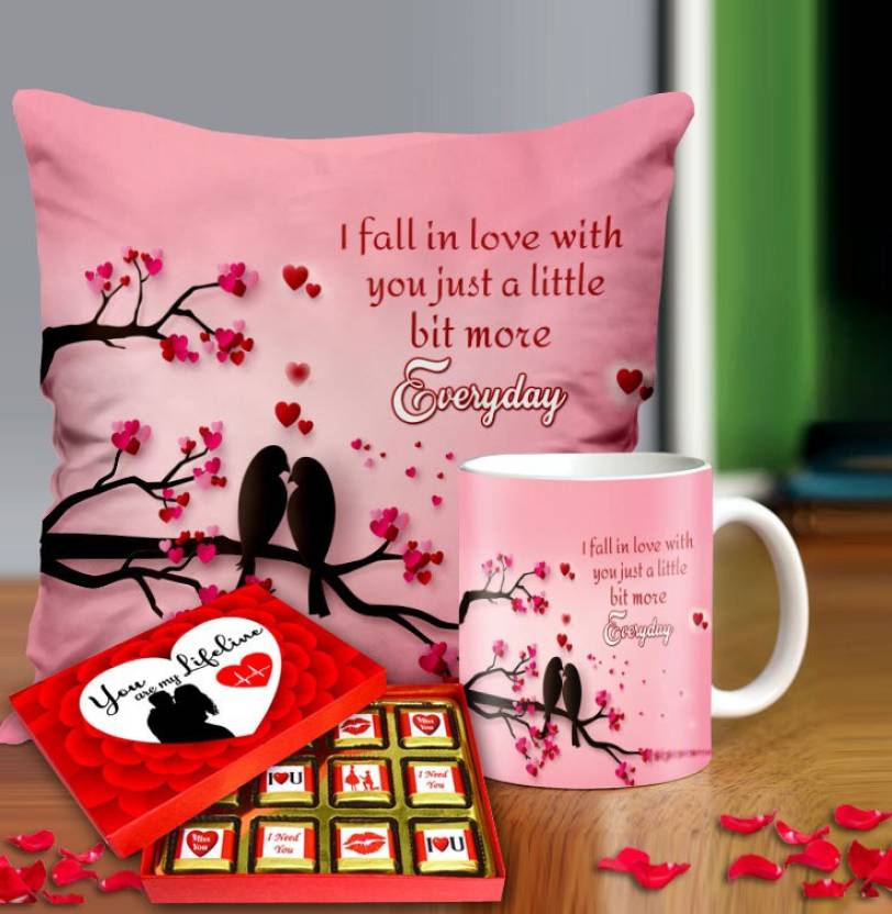 Valentine gift set featuring premium chocolates, a romantic printed mug, and a soft cushion – perfect for expressing love to your partner.