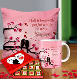 Valentine gift set featuring premium chocolates, a romantic printed mug, and a soft cushion – perfect for expressing love to your partner.