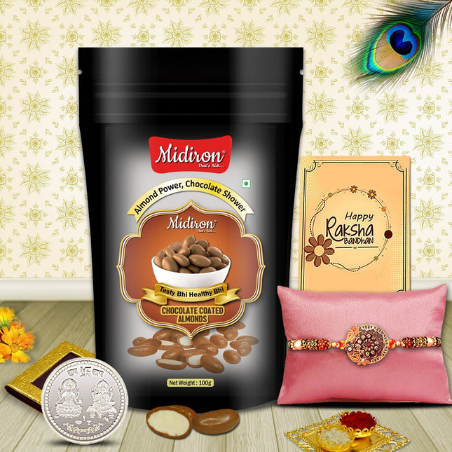 Rakhi gift pack highlighting chocolate almonds, handcrafted Rakhi, silver coin, and greeting card with roli-chawal for rituals.