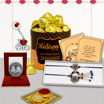 Fancy Bhaiya Bhabhi Couple Rakhi Set featuring Chocolate Box, Bro Keychain, Silver Coin, Traditional Lumba Rakhi Combo, Stylish Raksha Bandhan Gift Pack with Roli Akshat and Greeting Card