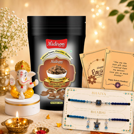 Premium Lumba Rakhi Gift for Bhaiya Bhabhi with Choco Almond, Ganesh Idol, Designer Bhai Bhabhi Rakhi Set, Raksha Bandhan Chocolate Celebration Combo with Roli Akshat and Greeting Card