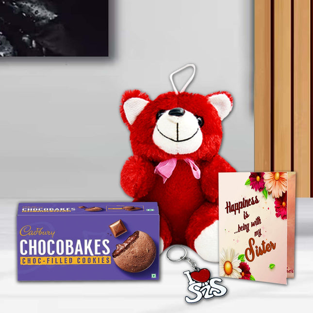 Red teddy bear with a pink bow, Cadbury Chocobakes cookies, keychain, and card 