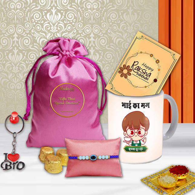 Shiny rakhi with crystal accents,Designer rakhi with ethnic feel,Fancy rakhi for stylish brother,Classy rakhi with gold detailing
