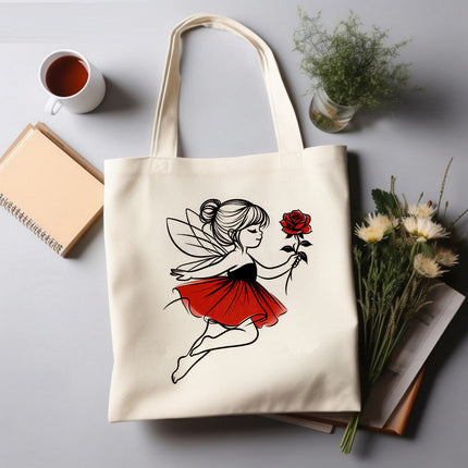 Tote bag with fairy design holding a rose on a gray surface with a cup, book, and plant.
tote purse for women
modern tote bag for women
daily essentials tote bag
multifunctional tote bag for girls