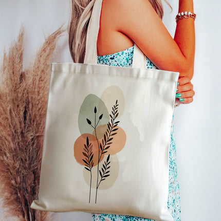 Tote bag with floral design held by a person against a neutral background
multifunctional tote bag for girls
canvas tote with waterproof lining