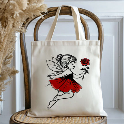 Tote bag with fairy design holding a rose on a wooden chair.
heavy duty tote bag for women
stylish office bag for womeN