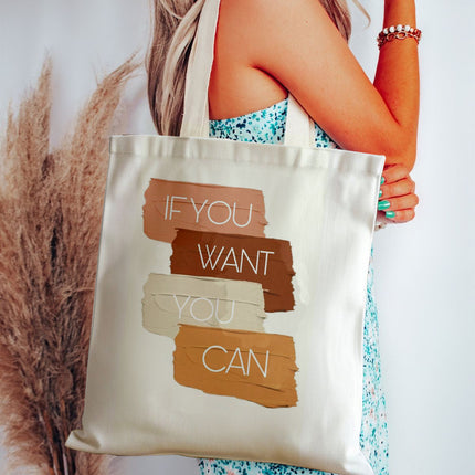 Tote bag with motivational quote held by a person, with pampas grass in the background
ladies canvas handbag
fashionable tote bag for women