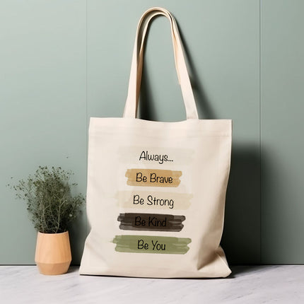 Beige tote bag with motivational quote on a light green background
professional tote bag for women
travel handbag for girls
