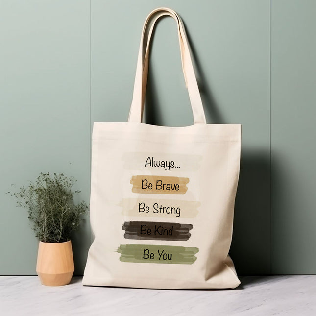 Beige tote bag with motivational quote on a light green background
professional tote bag for women
travel handbag for girls
