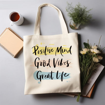 Tote bag with motivational quote on a table with a cup, book, and flowers.
waterproof tote handbag for girls
office shoulder bag for women
designer canvas tote bag
everyday tote bag for women